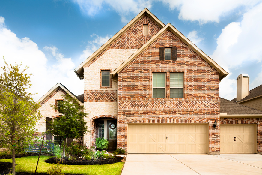 Architecture, Real Estate:  New brick, stone home. Texas suburban neighborhood.